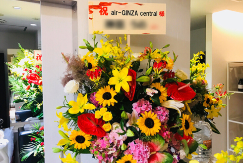 銀座 air-GINZAcentral様の開店祝い黄色系スタンド花