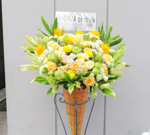 銀座 air-GINZAcentral様の開店祝い黄色×オレンジスタンド花